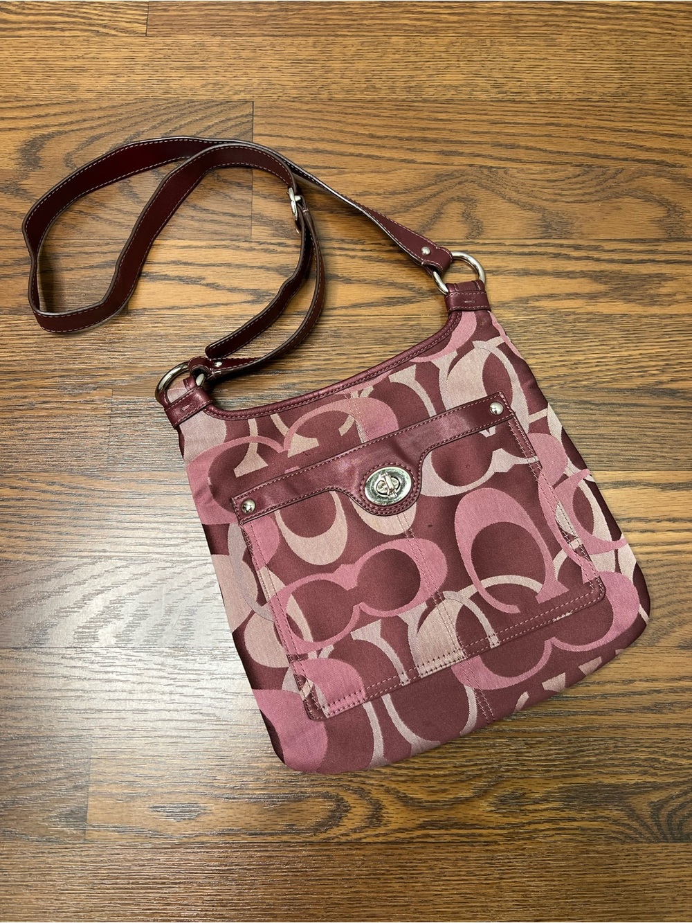 Coach Penelope Optic Signature Hippie Crossbody Bag in a purple/plum color